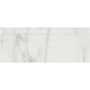 Polished Calacatta Gold marble baseboard trim measuring 4 3/4 x 12 inches, showcasing elegant veining and smooth surface.