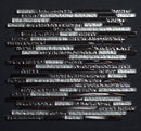 Glass mosaic tile pattern on a black background