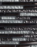 Close-up of a metallic mosaic tile with reflective properties