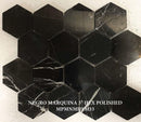 Hexagonal black marble tiles on a light background