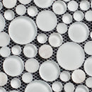 Pattern of white ceramic plates on a black geometric background