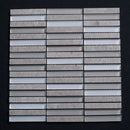 Mosaic tile pattern with gray and white stripes on a black background