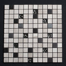 Mosaic tile sample with black and white squares on a dark background