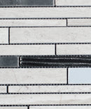 Close-up of a tiled wall with gray and black bricks