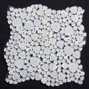 White pebble mosaic tile on a black background