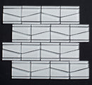 Glass mosaic tile pattern on a black background
