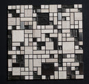 Mosaic pattern of black, white, and gray tiles on a dark background