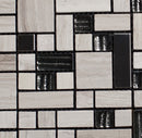 Mosaic pattern of black, white, and gray tiles