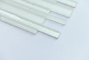 White glass mosaic tiles on a light gray background