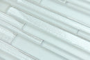 Close-up of light gray glass mosaic tiles with a subtle pattern