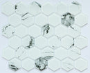 Hexagonal marble mosaic tiles with a white and gray pattern on a light gray background