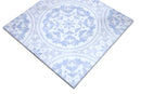 Close-up of Amelia Iris marble mosaic showing blue floral ornamental detailing