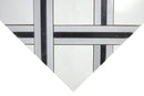 Close-up of polished Dolomite and black marble mosaic tile with linear detailing