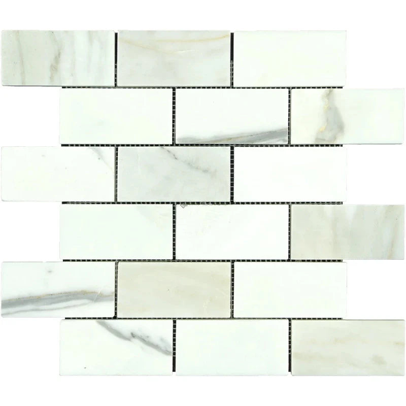 Calacatta Gold Marble 2x4 Honed Mosaic Tile.