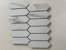 Calacatta marble picket mosaic installed as a luxury kitchen backsplash with polished finish