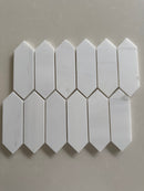 Dolomite honed marble picket mosaic tile featuring soft white and gray natural stone in a modern linear design