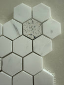 Dolomite marble hexagon terrazzo mosaic installed as a modern kitchen backsplash