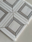 Linear marble mosaic featuring Dolomite and Palissandro stone in a contemporary pattern