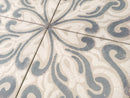 Dune Atlantique Josselin 8x8 decorative porcelain tile installed in a stylish residential entryway