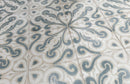 Dune Atlantique Josselin 8x8 decorative porcelain tile featuring an artisan-inspired pattern in a decorative floor installation