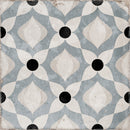 Blue and white patterned porcelain tile flooring featured in a bright residential interior
