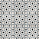 Decorative blue porcelain floor tile installation with vintage-inspired geometric pattern