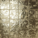 Decorative porcelain tile creating a statement feature wall with golden tones
