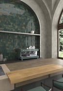 Glossy emerald green porcelain tile creating a decorative feature wall

