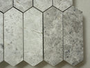 Honed Tundra marble picket tile showing elongated stone pieces in a clean architectural layout

