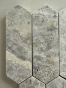 Honed Silver Travertine mosaic tile installed on a bathroom feature wall