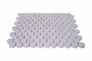 Limestone Penny Round Honed Mosaic Tile by Mythology Tile, showing smooth, rounded limestone tiles arranged in a mosaic pattern.