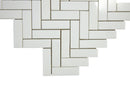 Close-up of polished Thassos marble herringbone mosaic tile