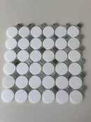 Natural stone tile mosaic featuring green mix Thassos circles from Roca, 12x12 inch size for feature walls.