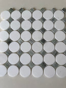 Roca Rockart Green Mix Thassos Circle mosaic tile for shower walls, featuring natural stone in green and white tones.