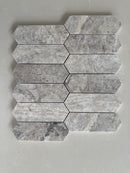 Modern Silver Travertine picket mosaic backsplash in a contemporary kitchen