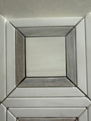 Dolomite and Palissandro marble mosaic installed as a kitchen backsplash