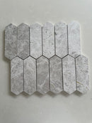 Tundra honed marble picket mosaic tile featuring natural gray and white stone in a modern linear pattern
