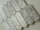 Tundra marble picket mosaic used as a refined kitchen backsplash with soft honed matte finish
